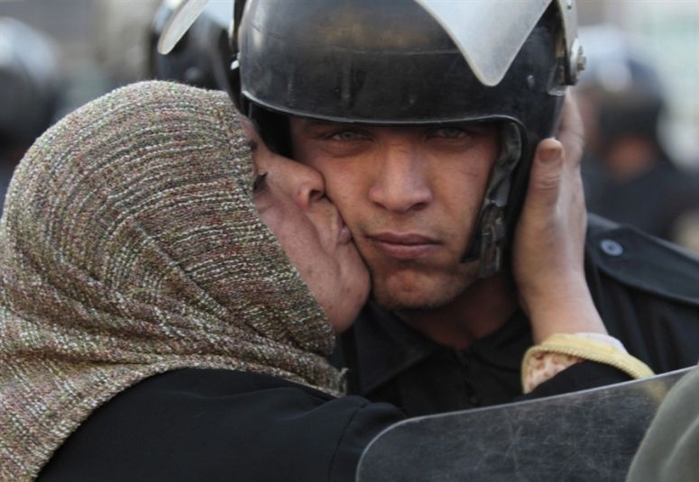 Protester Kisses Police During Egypt's 2011 Protests