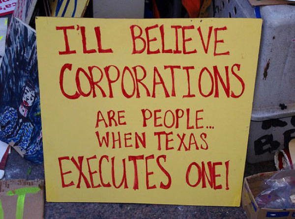 Corporation Texas Protest Sign