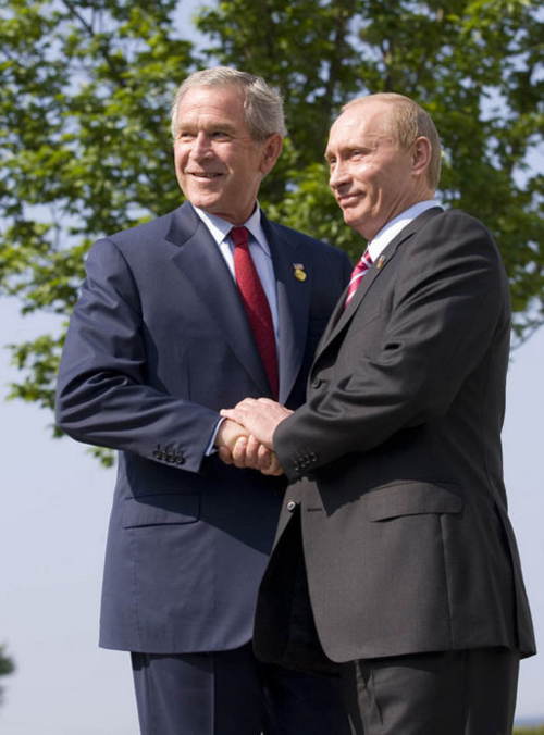 Putin Bush Holding Hands